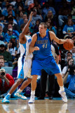 Dallas Mavericks v New Orleans Hornets: Dirk Nowitzki and Trevor Ariza Photographic Print by Chris Graythen