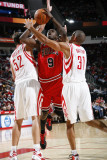 Chicago Bulls v Houston Rockets: Luol Deng, Brad Miller and Shane Battier Photographic Print by Bill Baptist