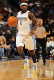 New York Knicks v Denver Nuggets: Ty Lawson Photographic Print by Doug Pensinger