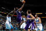 Sacramento Kings v New Orleans Hornets: Tyreke Evans and Emeka Okafor Photographic Print by Chris Graythen