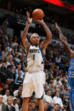 Oklahoma City Thunder v Minnesota Timberwolves: Michael Beasley and Jeff Green Photographie par David Sherman