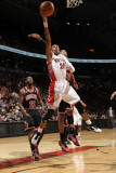 Chicago Bulls v Toronto Raptors: Leandro Barbosa and Taj Gibson Photographic Print by Ron Turenne