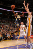 Indiana Pacers v Los Angeles Lakers: T.J. Ford and Pau Gasol Photographic Print by Andrew Bernstein