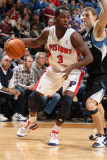 Detroit Pistons v Minnesota Timberwolves: Rodney Stuckey and Luke Ridnour Photographic Print by David Sherman