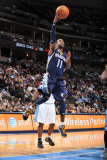 Memphis Grizzlies v Denver Nuggets: Mike Conley Photographic Print by Garrett Ellwood