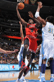 Chicago Bulls v Denver Nuggets: Luol Deng and Nene Photographic Print by Garrett Ellwood