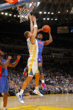 Detroit Pistons v Golden State Warriors: Rodney Stuckey and Andris Biedrins Photographic Print by Rocky Widner
