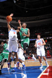 Boston Celtics v Philadelphia 76ers: Rajon Rondo and Andre Iguodala Photographic Print by Jesse D. Garrabrant