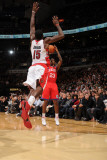 Philadelphia 76ers v Toronto Raptors: Louis Williams and Amir Johnson Photographic Print by Ron Turenne