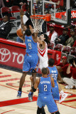 Oklahoma City Thunder v Houston Rockets: Serge Ibaka and Luis Scola Photographic Print by Bill Baptist