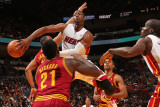 Cleveland Cavaliers v Miami Heat: Dwyane Wade and J.J. Hickson Photographic Print by Victor Baldizon