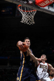 Indiana Pacers v Milwaukee Bucks: Jeff Foster and Ersan Ilyasova Photographic Print by Gary Dineen