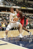 Toronto Raptors v Indiana Pacers: Tyler Hansbrough and Joey Dorsey Photographic Print by Ron Hoskins