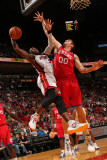 Philadelphia 76ers v Miami Heat: Dwyaen Wade and Spencer Hawes Photographic Print by Victor Baldizon