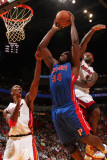 Detroit Pistons v Miami Heat: Jason Maxiell, Chris Bosh and LeBron James Photographic Print by Victor Baldizon