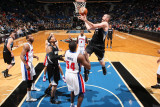 Detroit Pistons v Minnesota Timberwolves: Kevin Love and Jason Maxiell Photographic Print by David Sherman