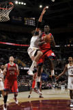 Philadelphia 76ers v Cleveland Cavaliers: Jrue Holiday and Anderson Varejao Photographic Print by David Liam Kyle