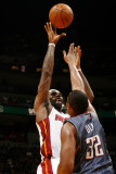 Charlotte Bobcats v Miami Heat: LeBron James and Boris Diaw Photographic Print by Issac Baldizon
