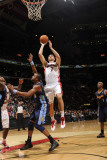 Denver Nuggets v Toronto Raptors: Andrea Bargnani and Shelden Williams Photographic Print by Ron Turenne