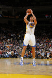 Denver Nuggets v Golden State Warriors: Dan Gadzuric Photographic Print by Rocky Widner