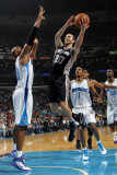 San Antonio Spurs v New Orleans Hornets: Manu Ginobili and David West Photographic Print by Layne Murdoch