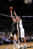Milwaukee Bucks v San Antonio Spurs: Andrew Bogut and Tim Duncan Photographic Print by D. Clarke Evans