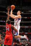 New Jersey Nets v Los Angeles Clippers: Blake Griffin and Derrick Favors Photographic Print by Noah Graham