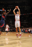 Atlanta Hawks v Toronto Raptors: Andrea Barngani and Josh Smith Photographic Print by Ron Turenne