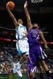 Sacramento Kings v New Orleans Hornets: Marcus Thornton and DeMarcus Cousins Photographic Print by Chris Graythen