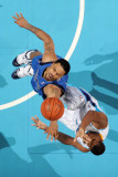Dallas Mavericks v New Orleans Hornets: Tyson Chandler and Trevor Ariza Photographic Print by Chris Graythen