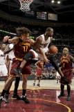 Miami Heat v Cleveland Cavaliers: Dwyane Wade and Anderson Varejao Photographic Print by David Liam Kyle