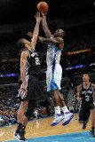 San Antonio Spurs v New Orleans Hornets: Emeka Okafor and Tim Duncan Photographic Print by Layne Murdoch