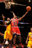 Chicago Bulls v Los Angeles Lakers: C.J. Watson and Lamar Odom Photographic Print by Noah Graham