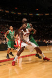 Boston Celtics v Toronto Raptors: Amir Johnson and Kevin Garnett Photographie par Ron Turenne