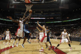 Denver Nuggets v Toronto Raptors: Al Harrington and Amir Johnson Photographic Print by Ron Turenne