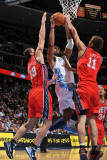 New Jersey Nets v Denver Nuggets: Nene, Kris Humpries and Brook Lopez Photographic Print by Garrett Ellwood