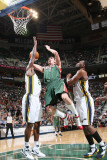 Milwaukee Bucks v Utah Jazz: Ersan Ilyasova, Al Jefferson and C.J. Miles Photographic Print by Melissa Majchrzak