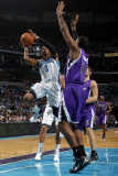 Sacramento Kings v New Orleans Hornets: Chris Paul and Carl Landry Photographic Print by Layne Murdoch