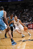 New Orleans Hornets v San Antonio Spurs: Tony Parker and Chris Paul Photographic Print by D. Clarke Evans