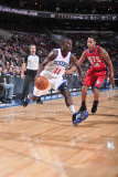 New Jersey Nets v Philadelphia 76ers: Jrue Holiday and Devin Harris Photographic Print by David Dow