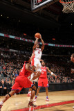 Philadelphia 76ers v Toronto Raptors: DeMar DeRozan and Evan Turner Photographic Print by Ron Turenne