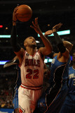 Orlando Magic v Chicago Bulls: Taj Gibson and Vince Carter Photographic Print by Jonathan Daniel