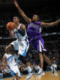 Sacramento Kings v New Orleans Hornets: Chris Paul and Luther Head Photographic Print by Layne Murdoch