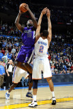 Sacramento Kings v Oklahoma City Thunder: Thabo Sefolosha and Tyreke Evans Photographic Print by Larry W. Smith