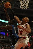 Orlando Magic v Chicago Bulls: Taj Gibson and Brandon Bass Photographic Print by Jonathan Daniel