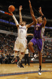 Phoenix Suns v Charlotte Bobcats: D.J. Augustin and Channing Frye Photographic Print by Kent Smith