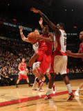 Houston Rockets v Toronto Raptors: Kyle Lowry and Amir Johnson Photographic Print by Ron Turenne