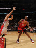 Philadelphia 76ers v Toronto Raptors: Andre Iguodala and Linas Kleiza Photographic Print by Ron Turenne