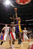Los Angeles Lakers v Toronto Raptors: Andrew Bynum and Joey Dorsey Photographic Print by Ron Turenne