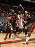 Chicago Bulls v Toronto Raptors: Luol Deng, Ed Davis and Carlos Boozer Photographic Print by Ron Turenne